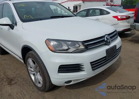 2014 Volkswagen Touareg Tdi Executive z USA, uszkodzony, nr VIN WVGEP9BP7ED001268